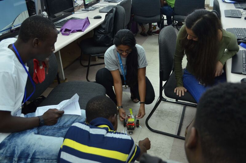 Mentor, Raeanne Ramharrack demonstrating the workings of the bot.